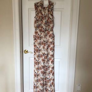 Ali and Jay floral jump suit xs